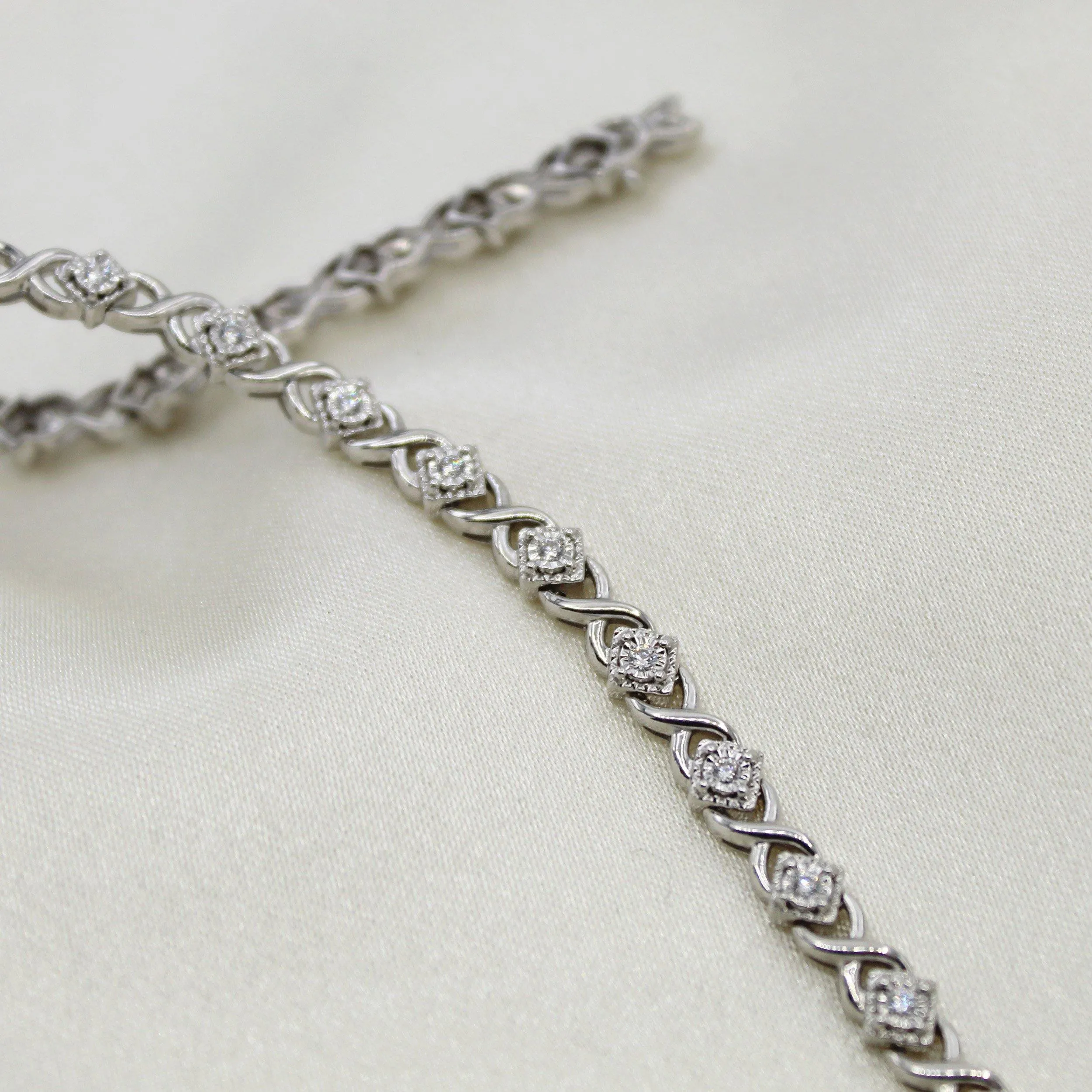 1/2ct tw Diamond XO Square Tennis Bracelet in Sterling Silver