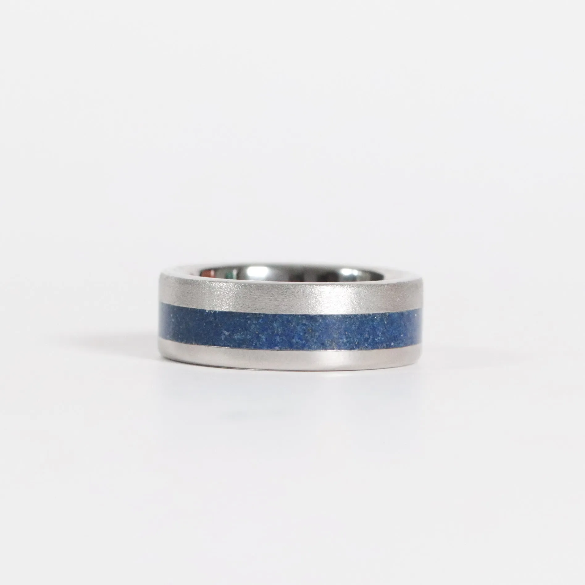 Serinium with Crushed Lapis Inlay and Stone Finish