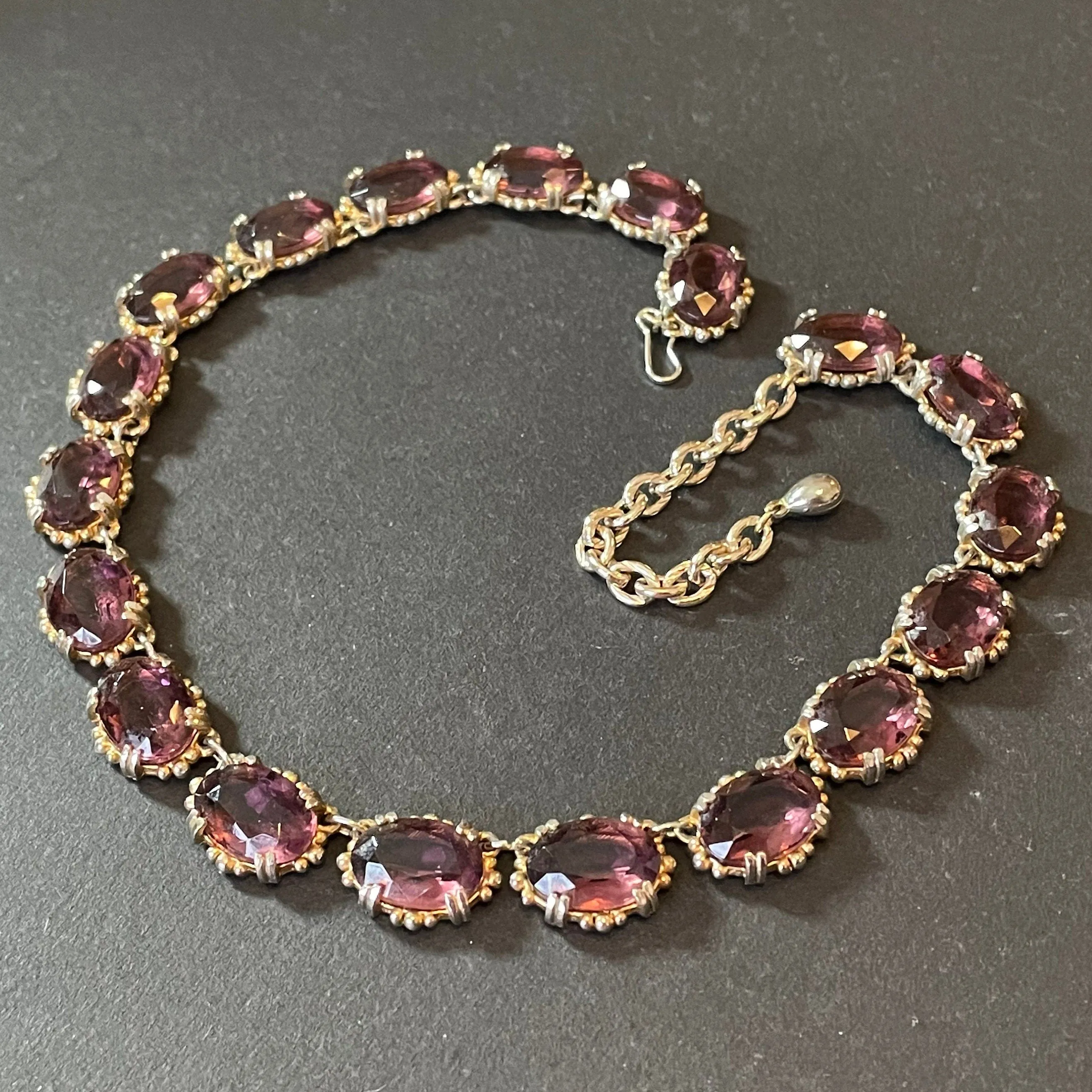 Vintage Sphinx amethyst purple glass riviere necklace, heavy, bezel set, open-backed stones in ornate gold tone setting